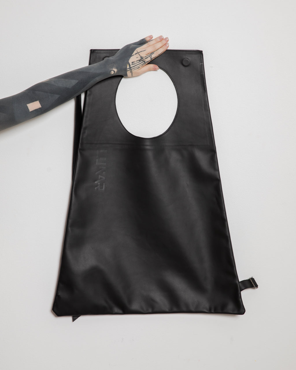 TRAPEZOIDAL MOON CALF LEATHER TOTE BAG